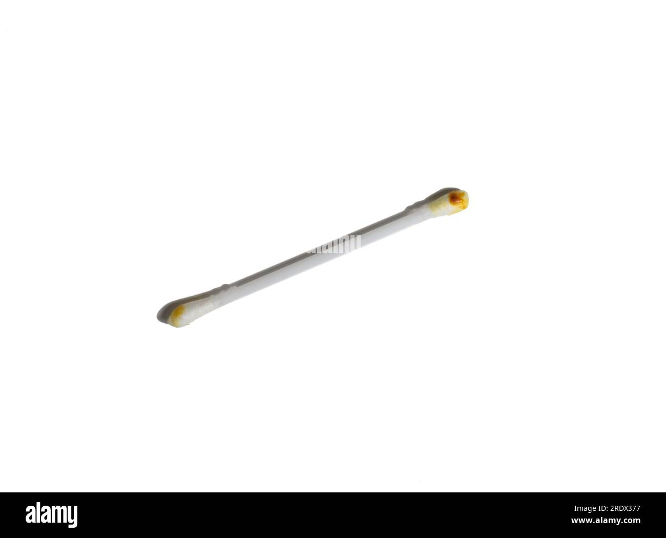 Dirty cotton swab . Earwax on cotton swabs. Personal hygiene. Dirt from