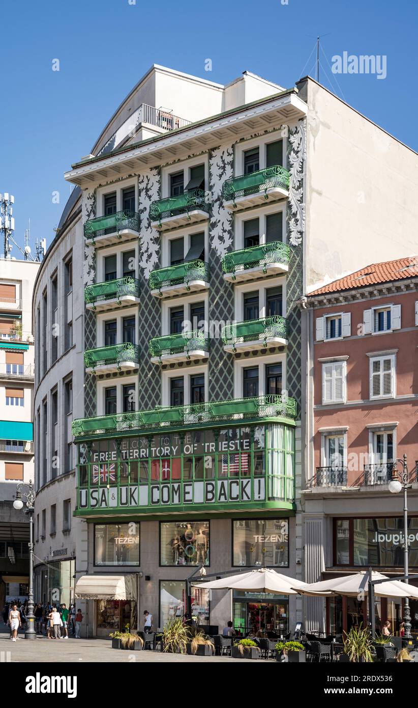 'Casa Bartoli', ornated with green balconies and floreal patterns, built in early 20th century in Liberty style, in piazza della Borsa, Trieste, Italy Stock Photo