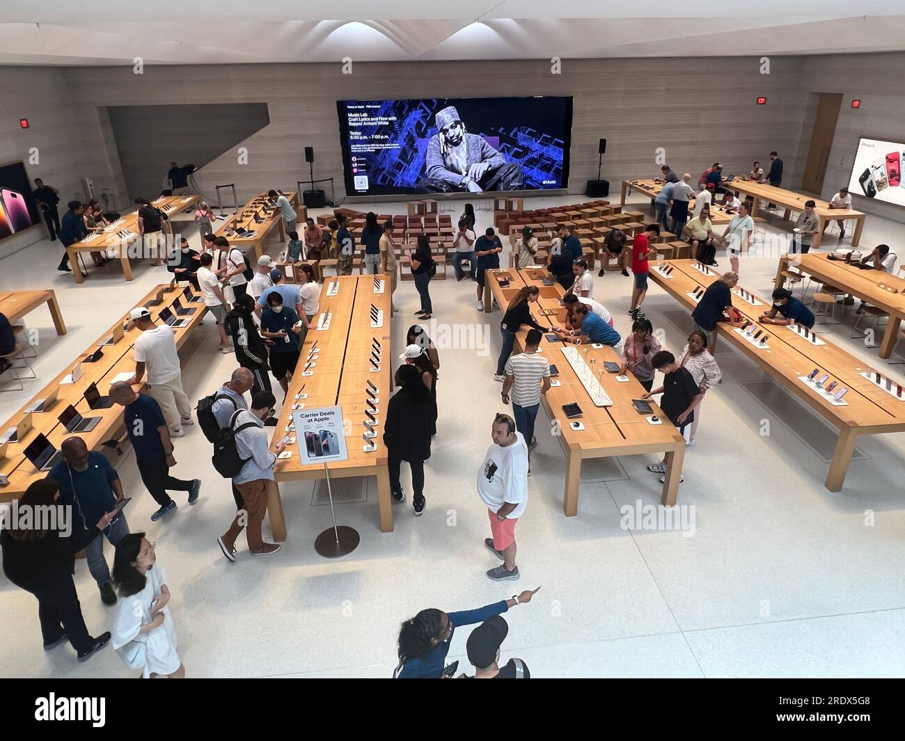 The always busy 24 hour Apple Store on 5th Avenue in New York City