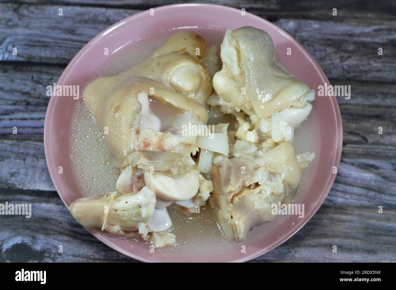 Arabic Egyptian cuisine of kawareh trotters with its traditional soup ...