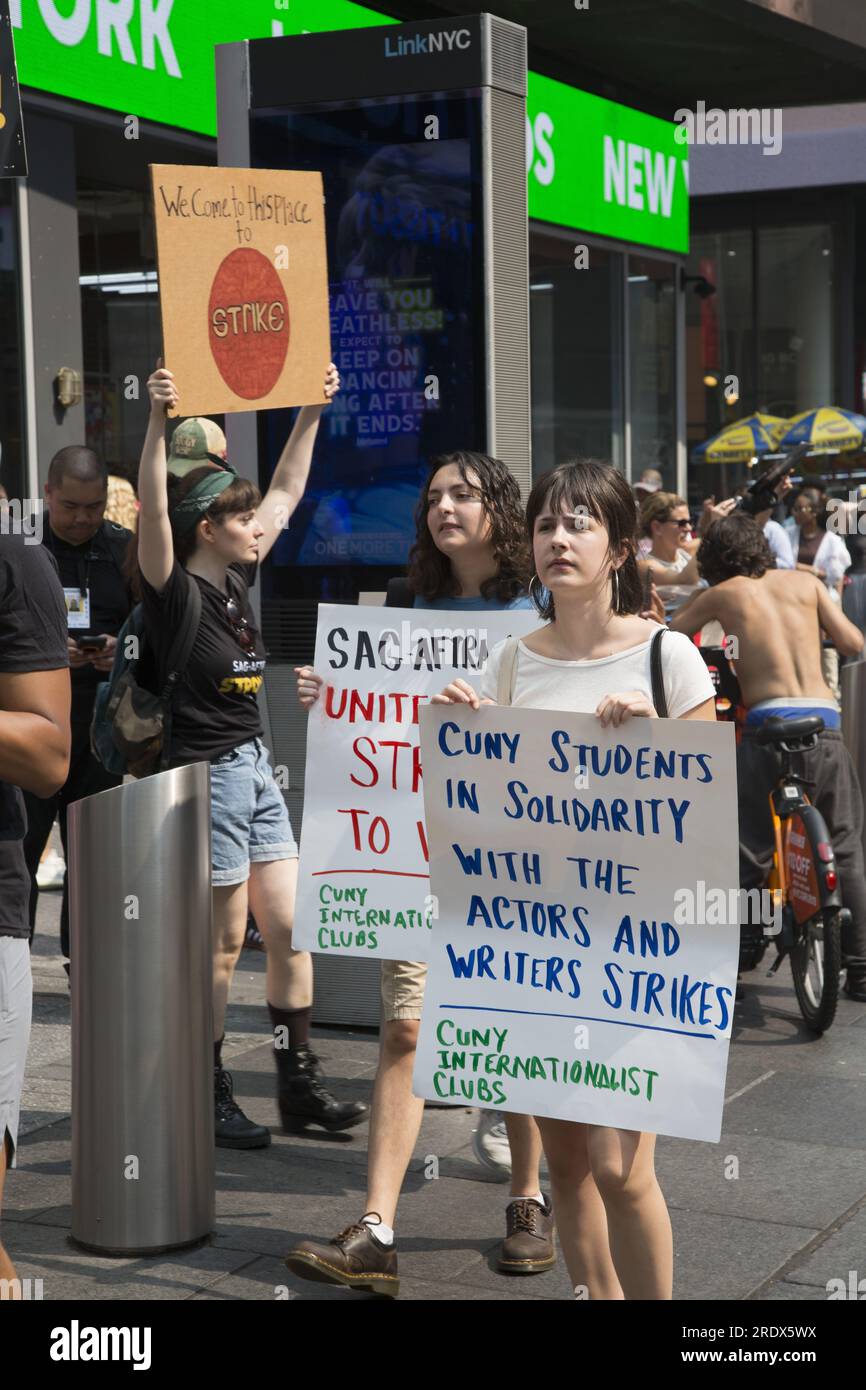 New York City: The strike continues among Writers Guild of America along with SAG-AFTRA  Union members with picket lines in multiple locations in in Manhattan. Union members demonstrate by Paramount building along Broadway in Times Square, crippling the entertainment industry. Stock Photo