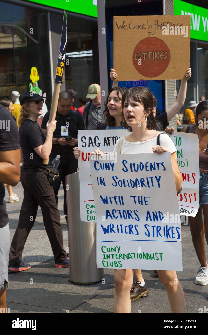 New York City: The strike continues among Writers Guild of America along with SAG-AFTRA  Union members with picket lines in multiple locations in in Manhattan. Union members demonstrate by Paramount building along Broadway in Times Square, crippling the entertainment industry. Stock Photo