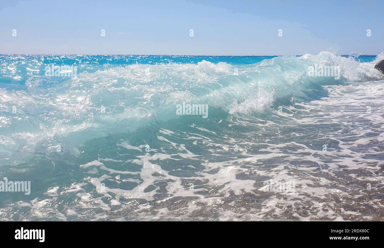 Idyllic view with  tendering wave on Mediterranean Sea coast of  French Riviera.  South vacations concept South vacations (recreation) and Vitamin D c Stock Photo