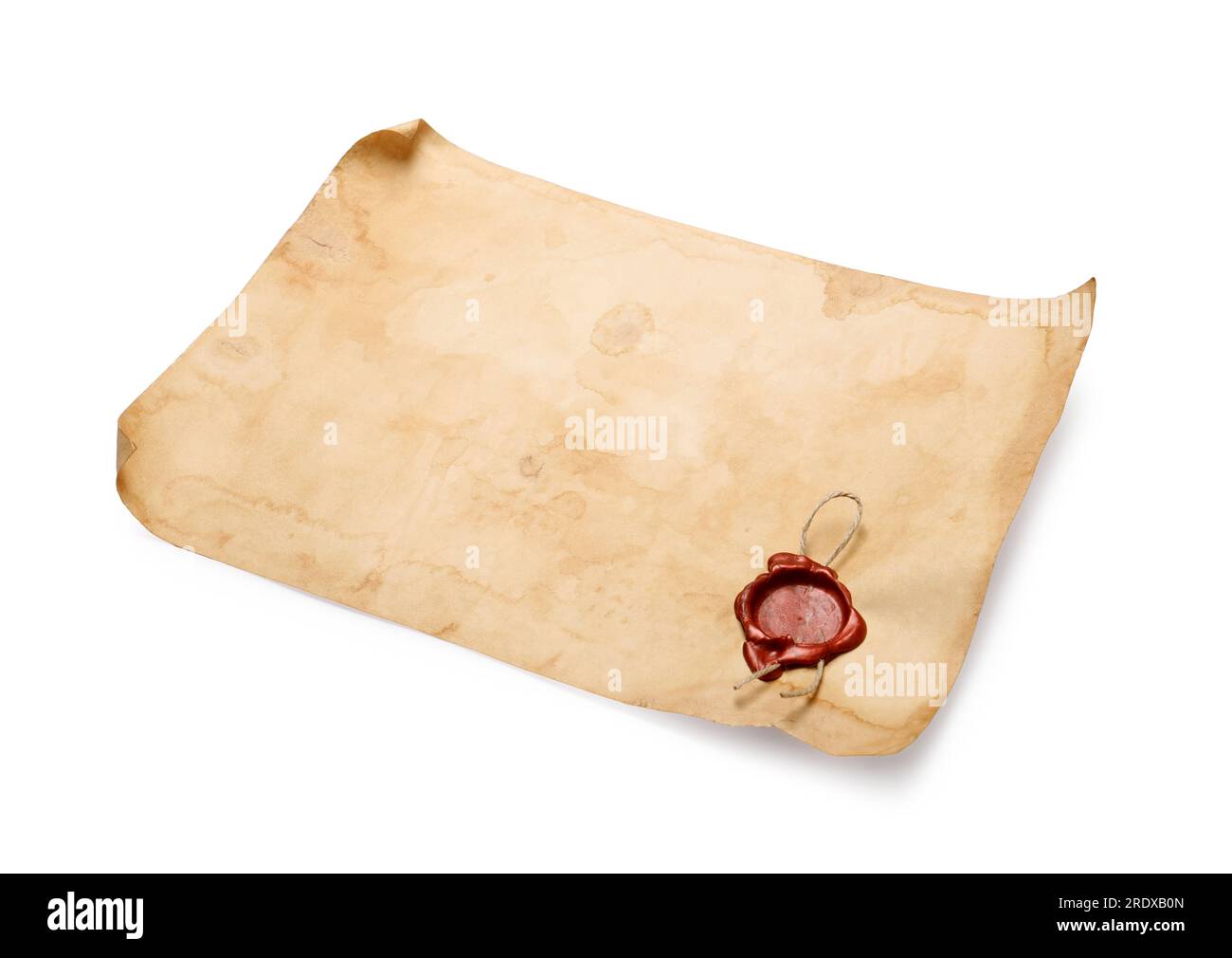 Sheet of old parchment paper with wax stamp on white background. Space