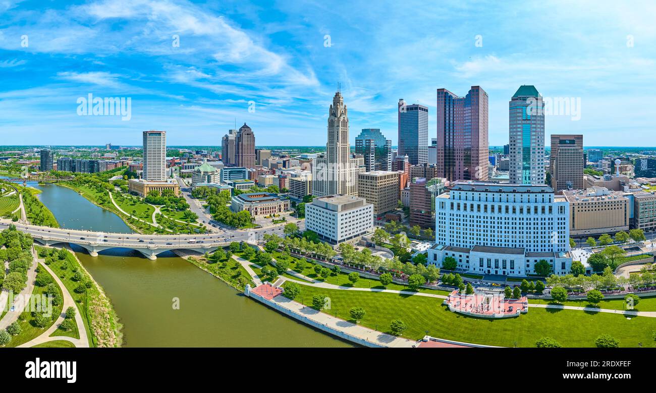 Aerial panorama Columbus Ohio with bright blue sky with clouds and bridge over Scioto river Stock Photo