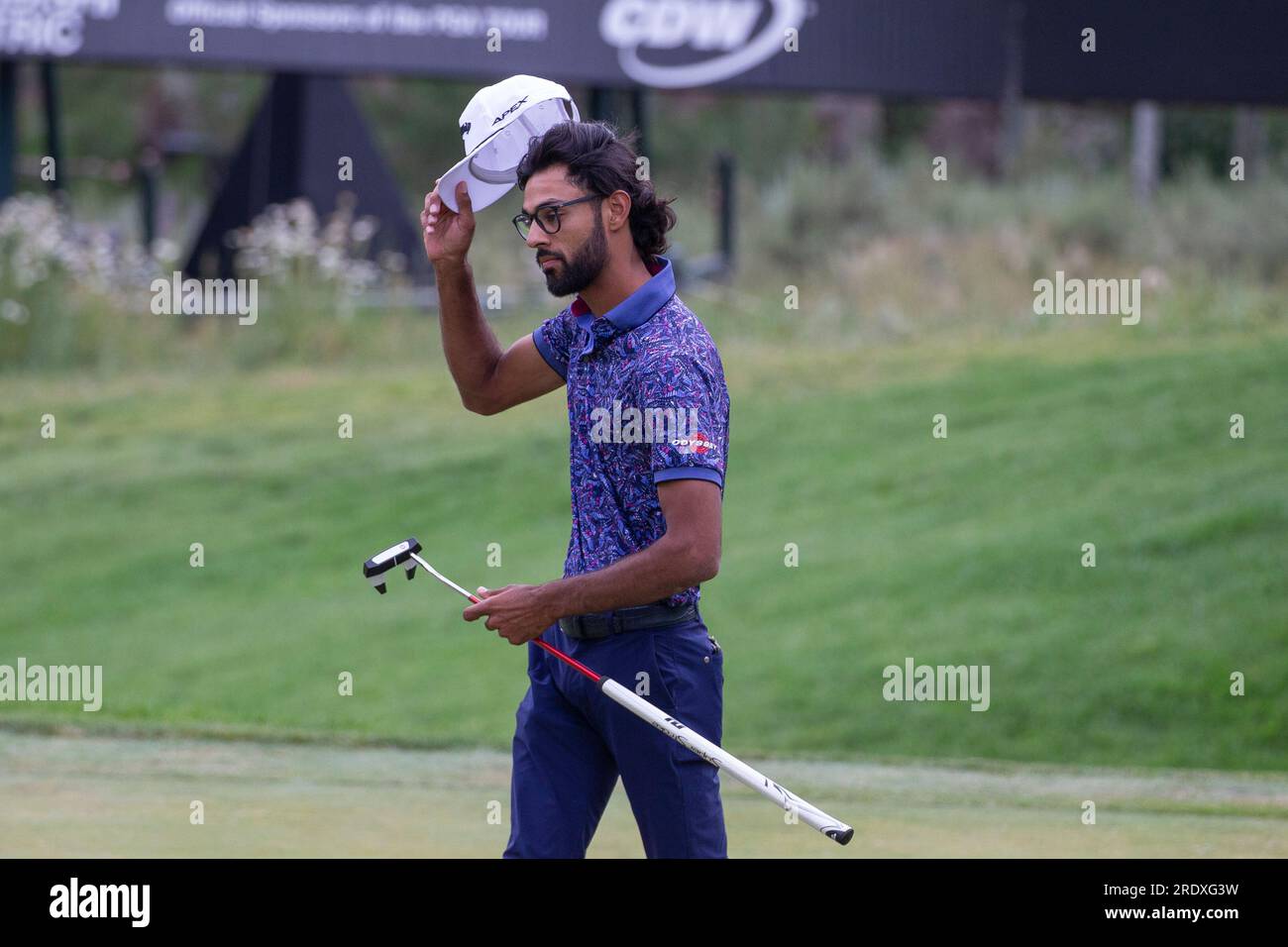 Akshay Bhatia tips his hat after winning the Barracuda Championship