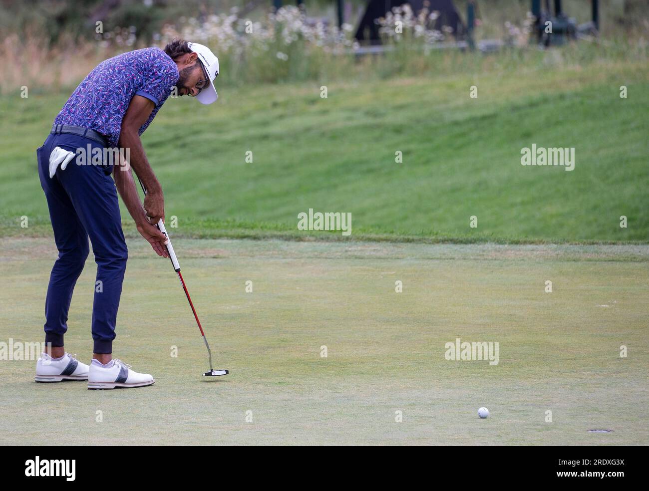 Akshay Bhatia putts the ball during the final round of the Barracuda