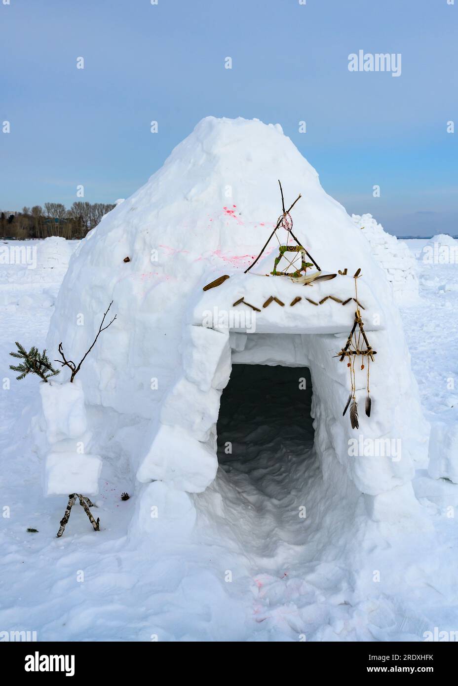 Igloo, a national shelter from the cold of the northern peoples, made of snow bricks Stock Photo