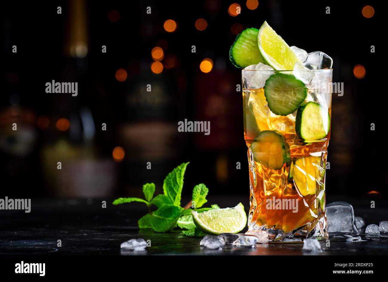 Pimms with cucumber, lime and ice alcoholic cocktail drink with vodka