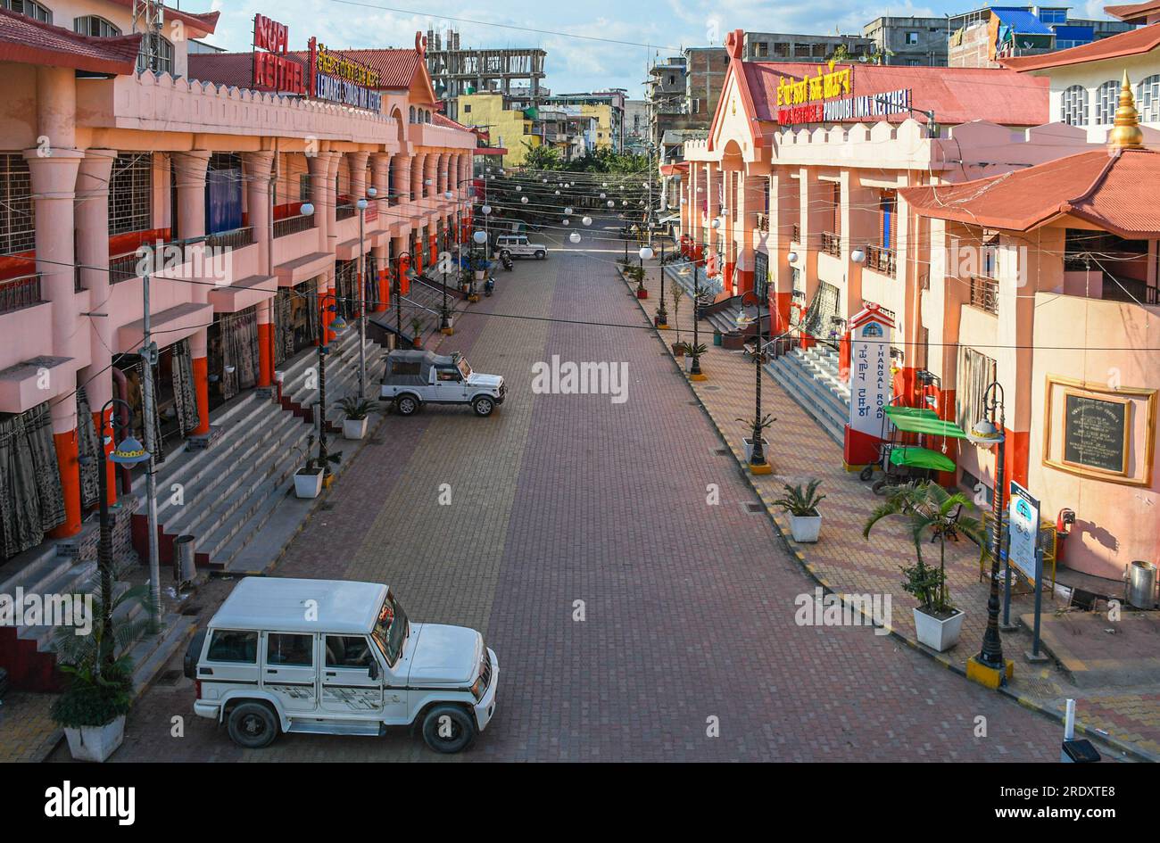 General view of the closed Ima Keithel market during a curfew in Imphal. The Manipur government has imposed a one-day curfew and lifted the daily relaxation of curfew from 5 am to 6 pm in the five valley districts. The Ima Keithel, which used to sell everything from clothing to vegetables to essentials, looks empty and deserted as hundreds of small stores had been closed for at least two months. Ima Keithel market, also known as Khwairamband Bazaar or Mother Market, is the largest women-only market in Asia. The market is an important cultural and economic landmark, and all the stalls are run e Stock Photo