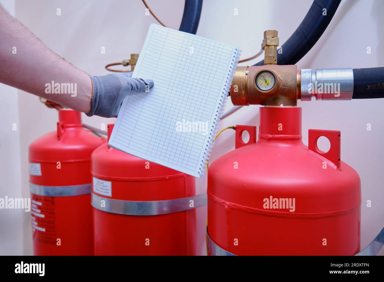 The man in charge of fire prevention and protection is conducting an inspection of the gas