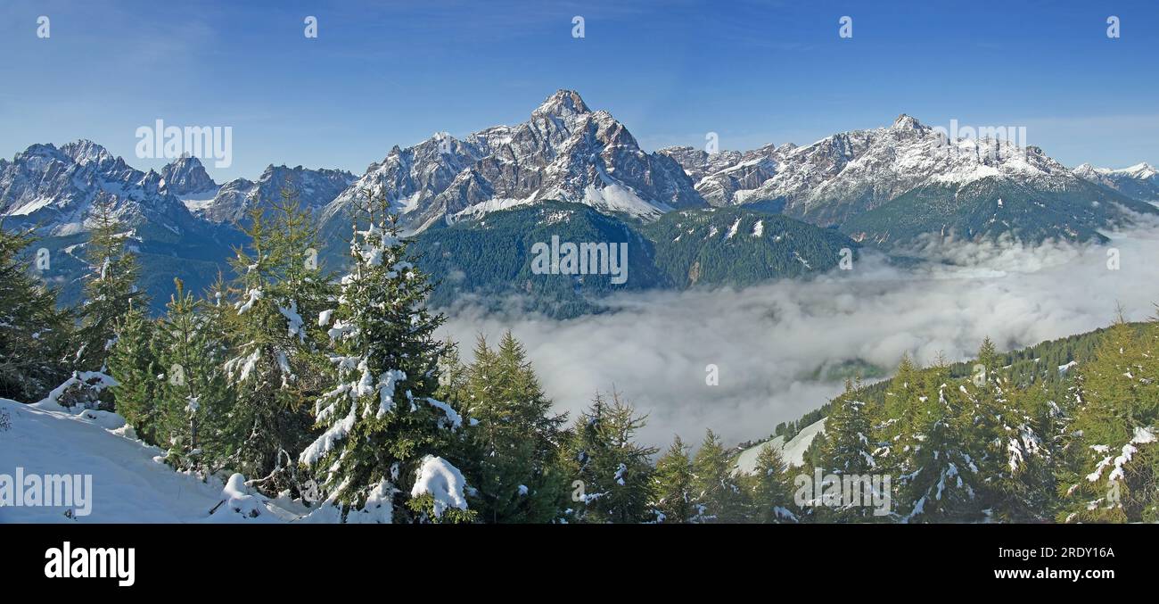 Sexten summits in first snow::  Einser, Dreischusterspitze and Gsellknoten (from left). Sextner Dolomiten, Italy Panoramic format 2:1 Stock Photo