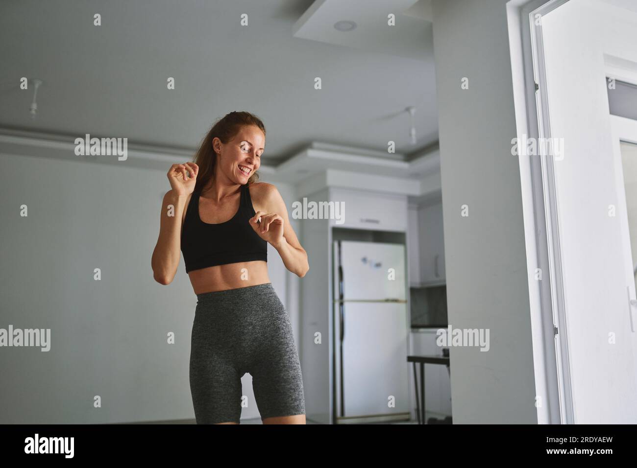 Woman dancing at home hi-res stock photography and images - Alamy