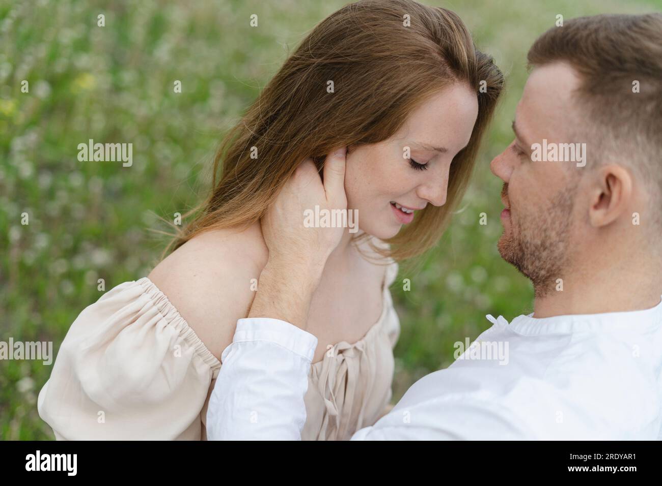 Young couple doing romance on field Stock Photo