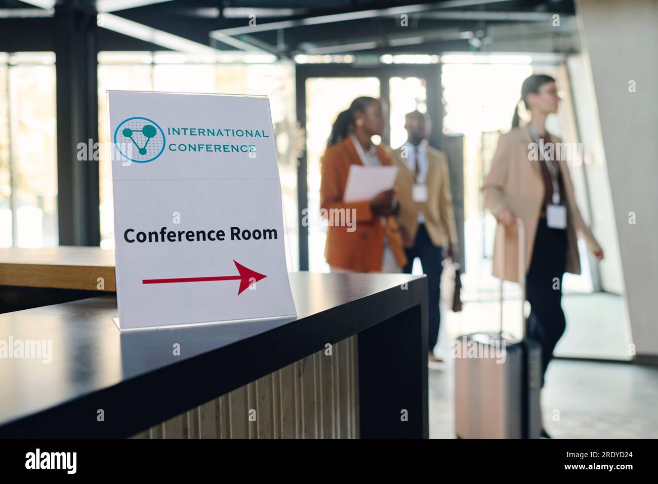 Conference room sign on reception desk at convention center Stock Photo