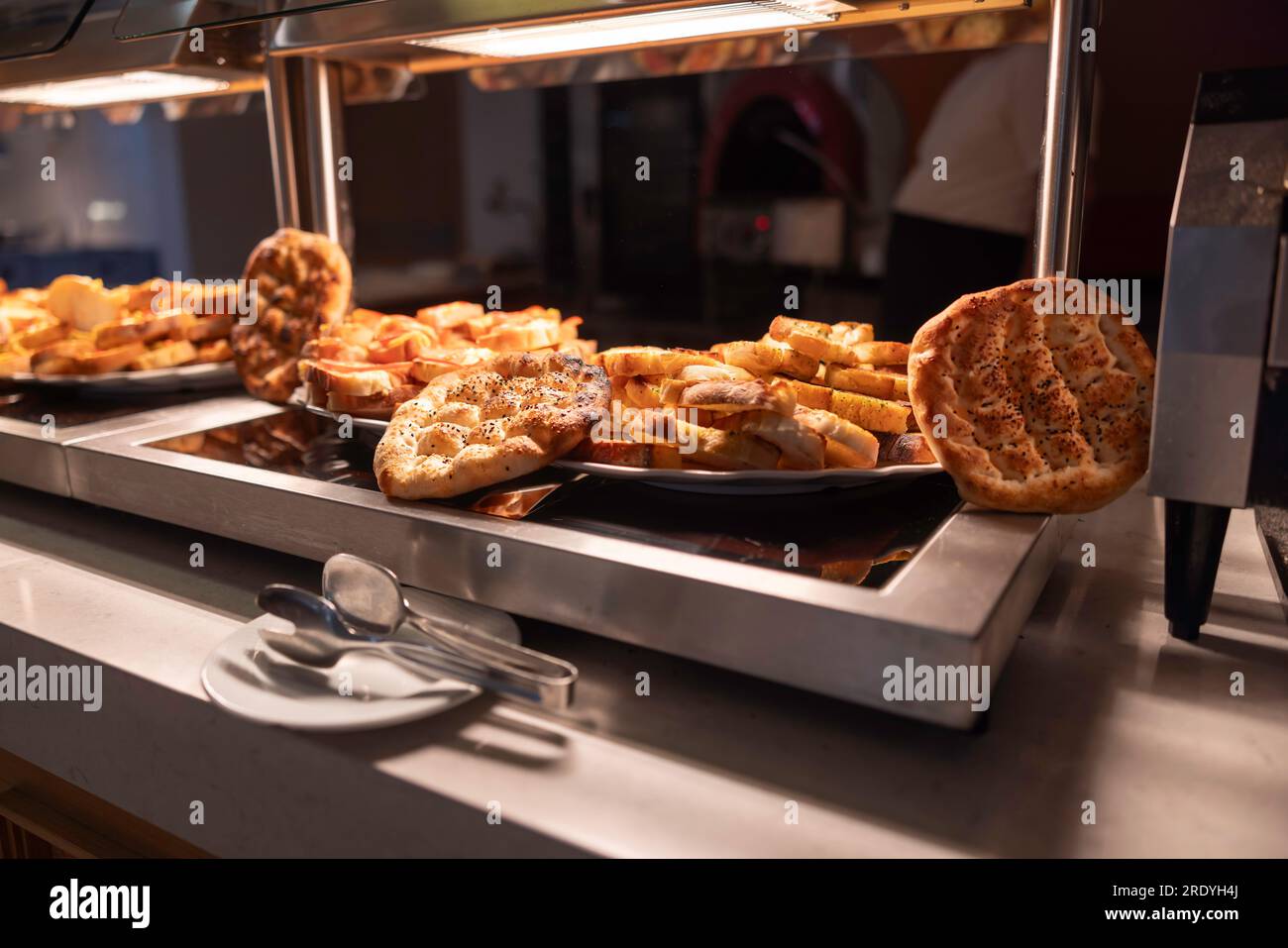 Various pastries on the buffet table in the hotel restaurant. Stock Photo