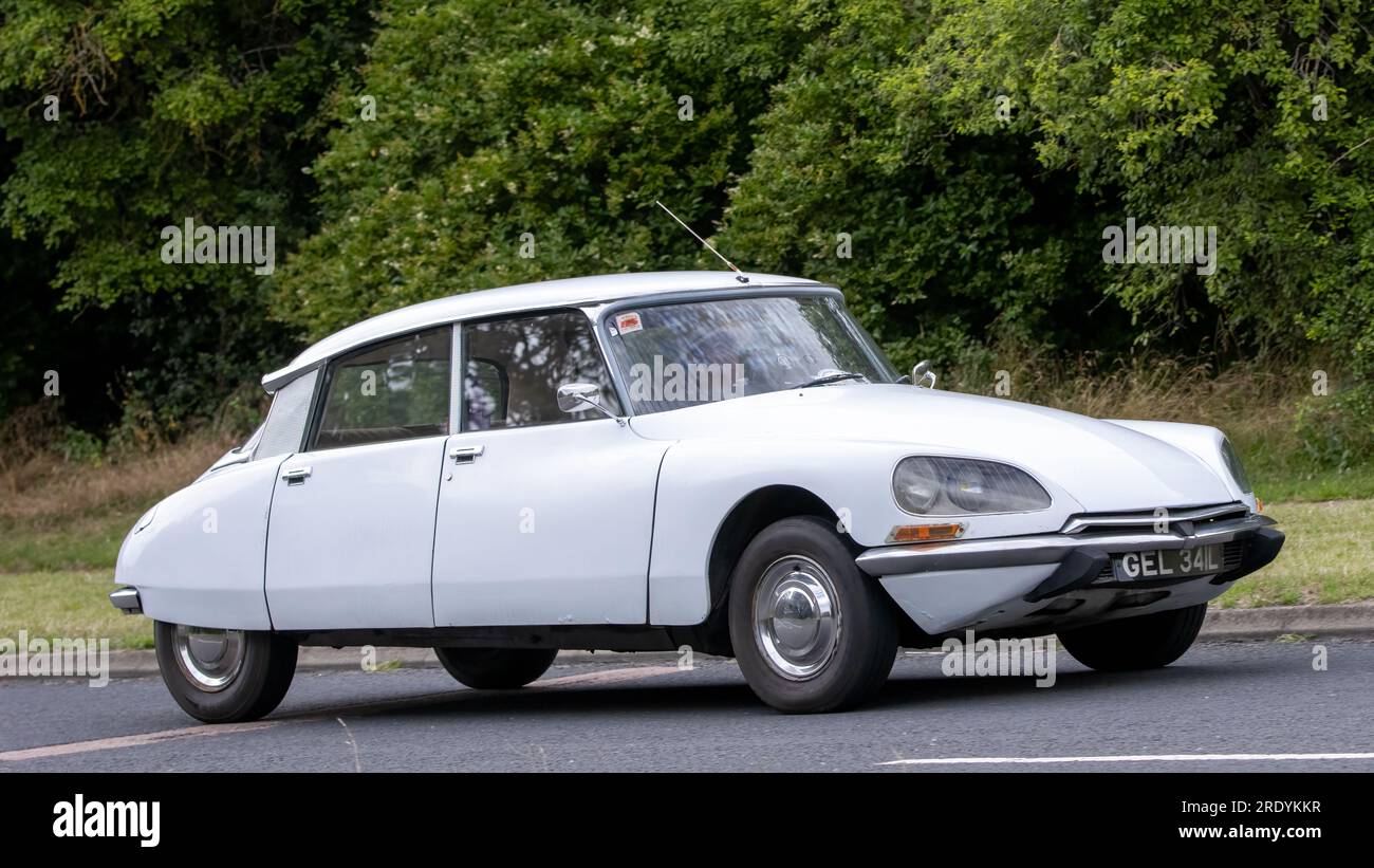 Milton Keynes,UK - July 21st 2023: 1972 white Citroen DS classic car driving on an English road Stock Photo