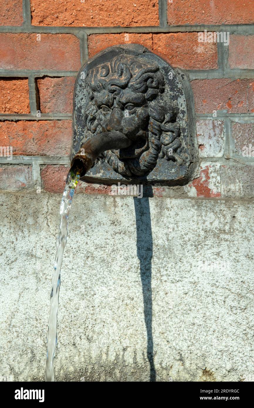Fountain in the shape of a lion's head in France Stock Photo