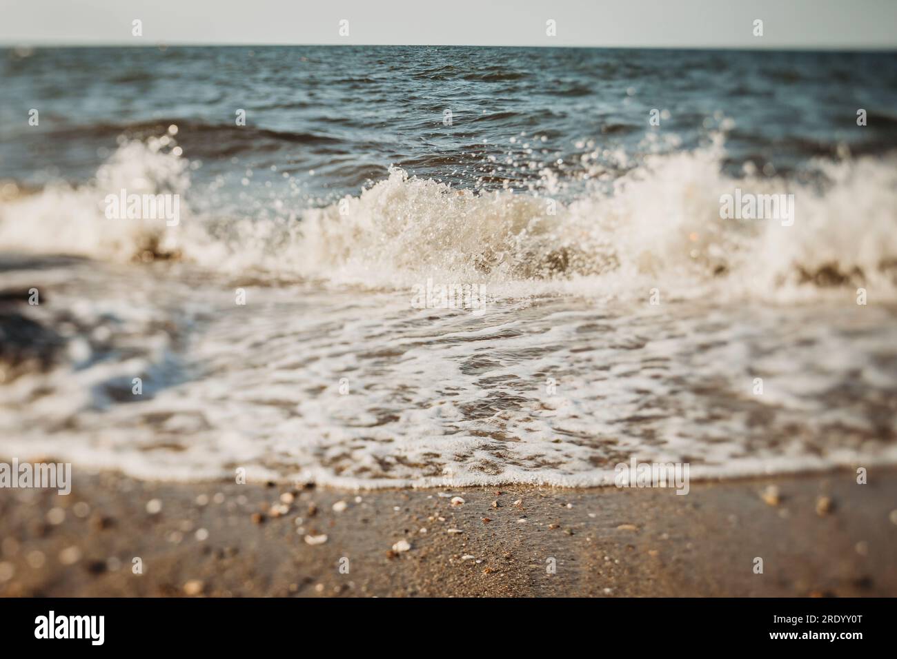 Ocean waves on a sunny day at beach shore in Cape Cod, Massachusetts Stock Photo