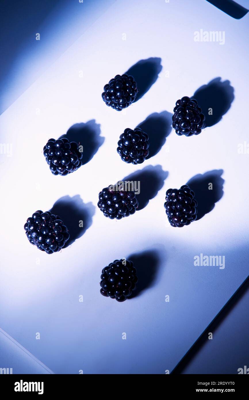 Top view on blackberries lying on cutting board Stock Photo