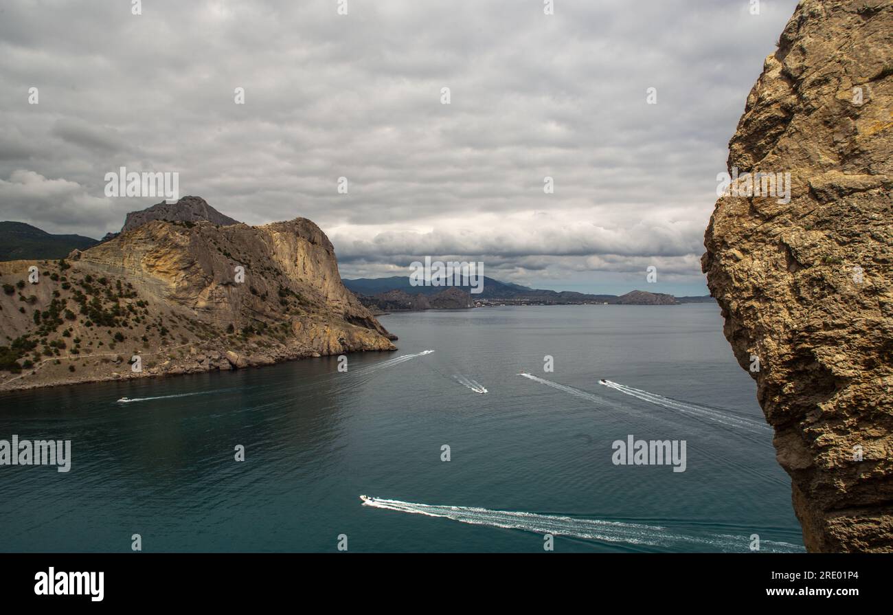 Cove with floating boats in Black sea Stock Photo