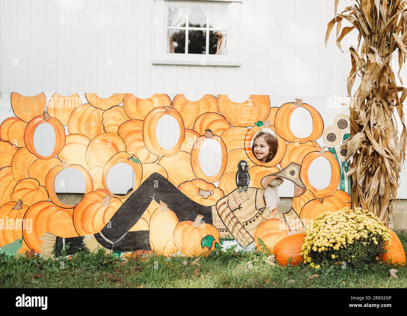 Young girl laughing at a Fall Pumpkin Festival in Ohio Stock Photo
