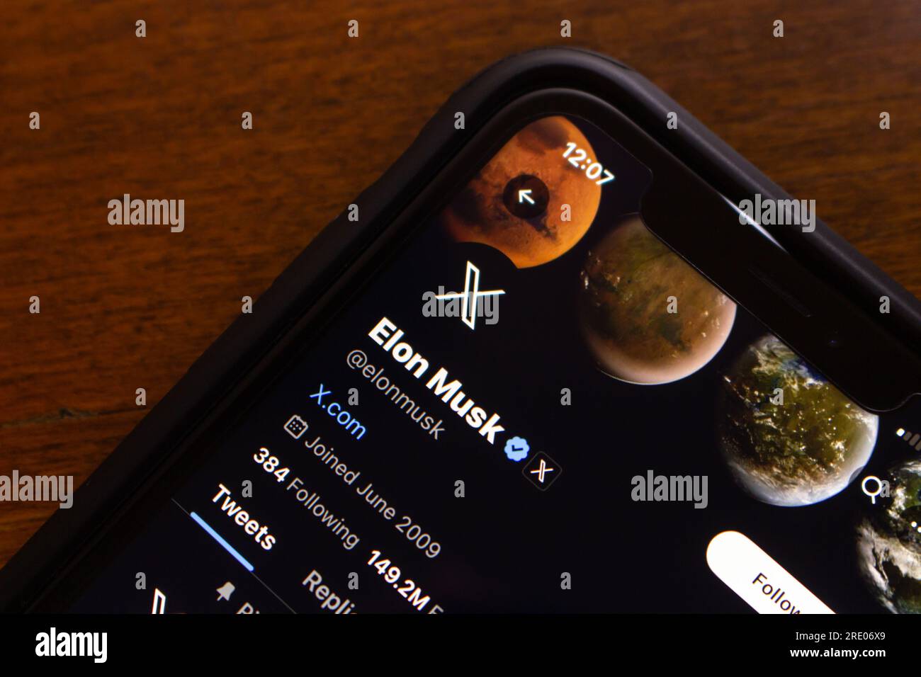 Elon Musk Twitter Account page seen in an iPhone. Elon Musk announced the Twitter name Rebrand as 'X'. The new X logo can be seen in an image. Stock Photo