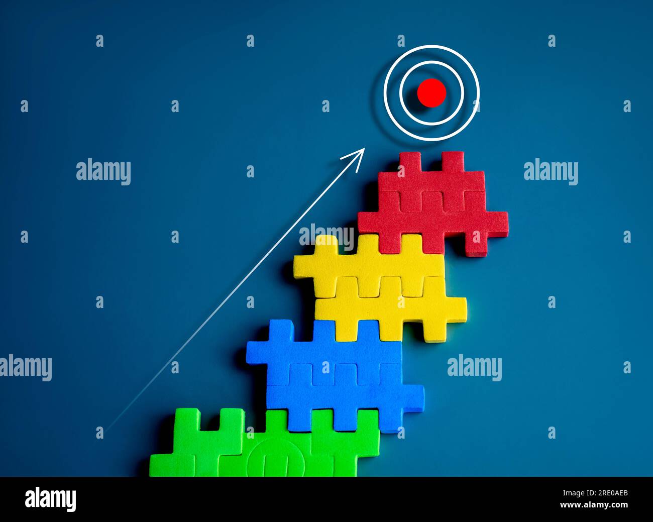 The ultimate goal, Target icon on top of colorful puzzle blocks as bar