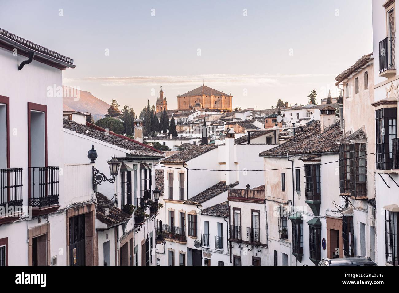 Views of the medieval village of Ronda with white Andalusian houses and the gothic style church of Santuario de Mar a Auxiliadora. Malaga, Spain Stock Photo