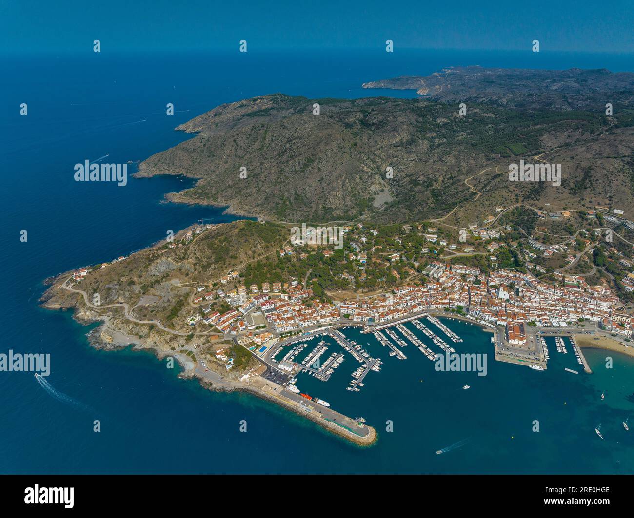 Aerial view of the town and bay of Port de la Selva, north of the Cap de Creus peninsula, on the Costa Brava coast (Empordà, Girona, Catalonia, Spain) Stock Photo