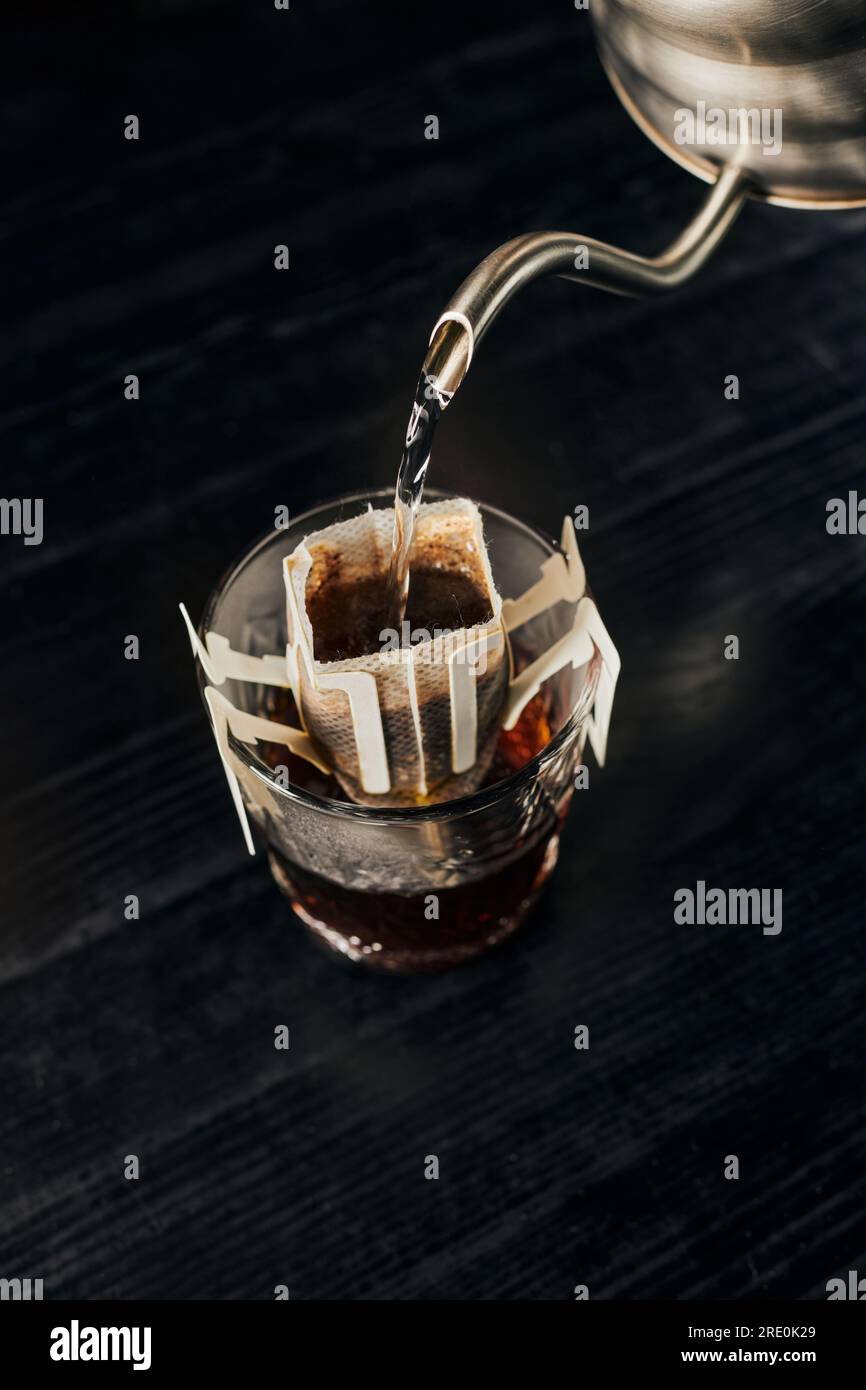 alternative brew, aromatic espresso, boiling water pouring into glass