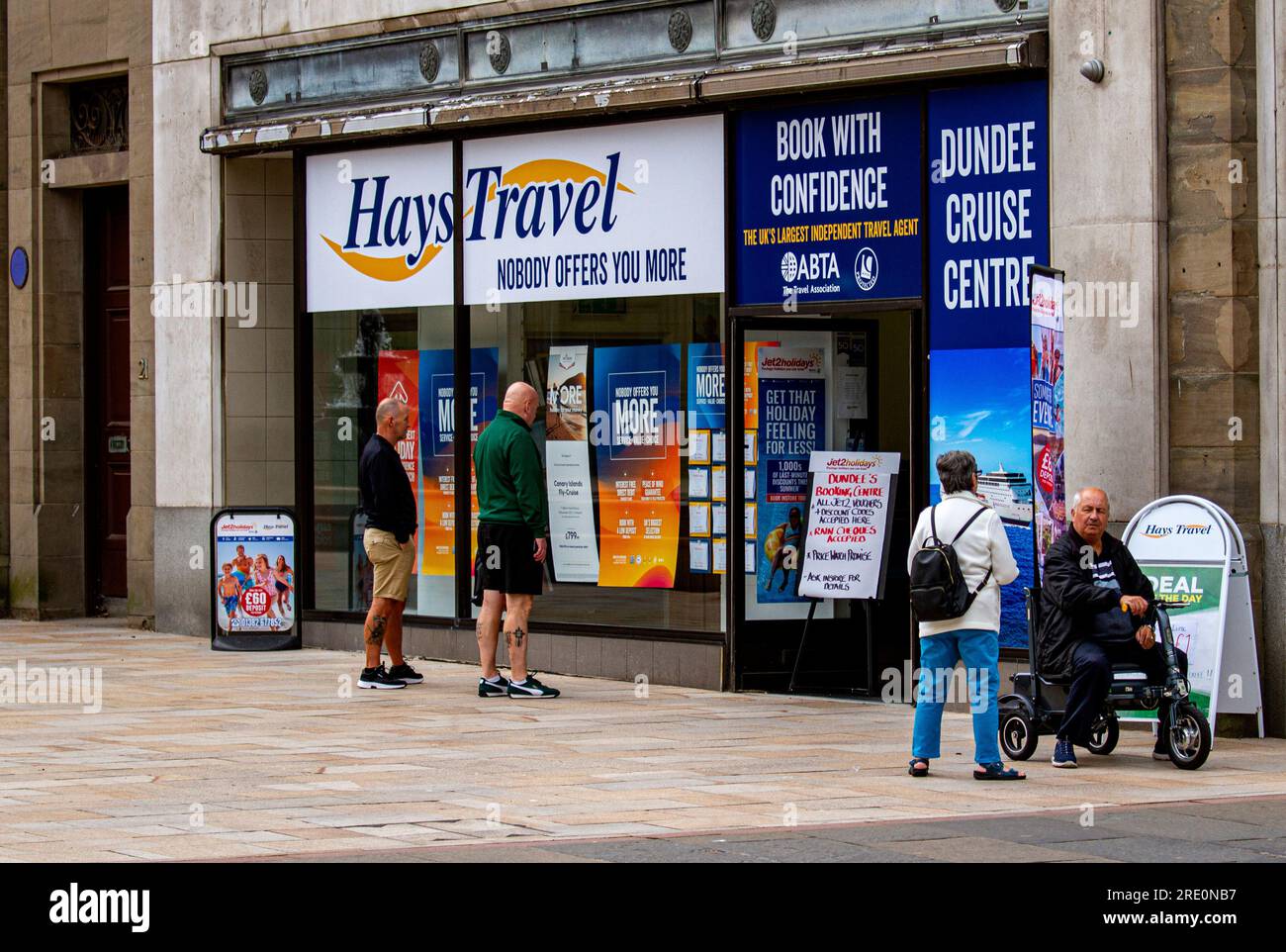 Dundee, Tayside, Scotland, UK. 24th July, 2023. UK Weather: The weather in Tayside, Scotland is bright and warm with temperatures reaching 20°C. Local public holiday Monday, known as The Dundee Fortnight, sees local residents out and about in the city centre having fun while shopping for the Summer offers of savings during Scotland's rising inflation situation. Credit: Dundee Photographics/Alamy Live News Stock Photo