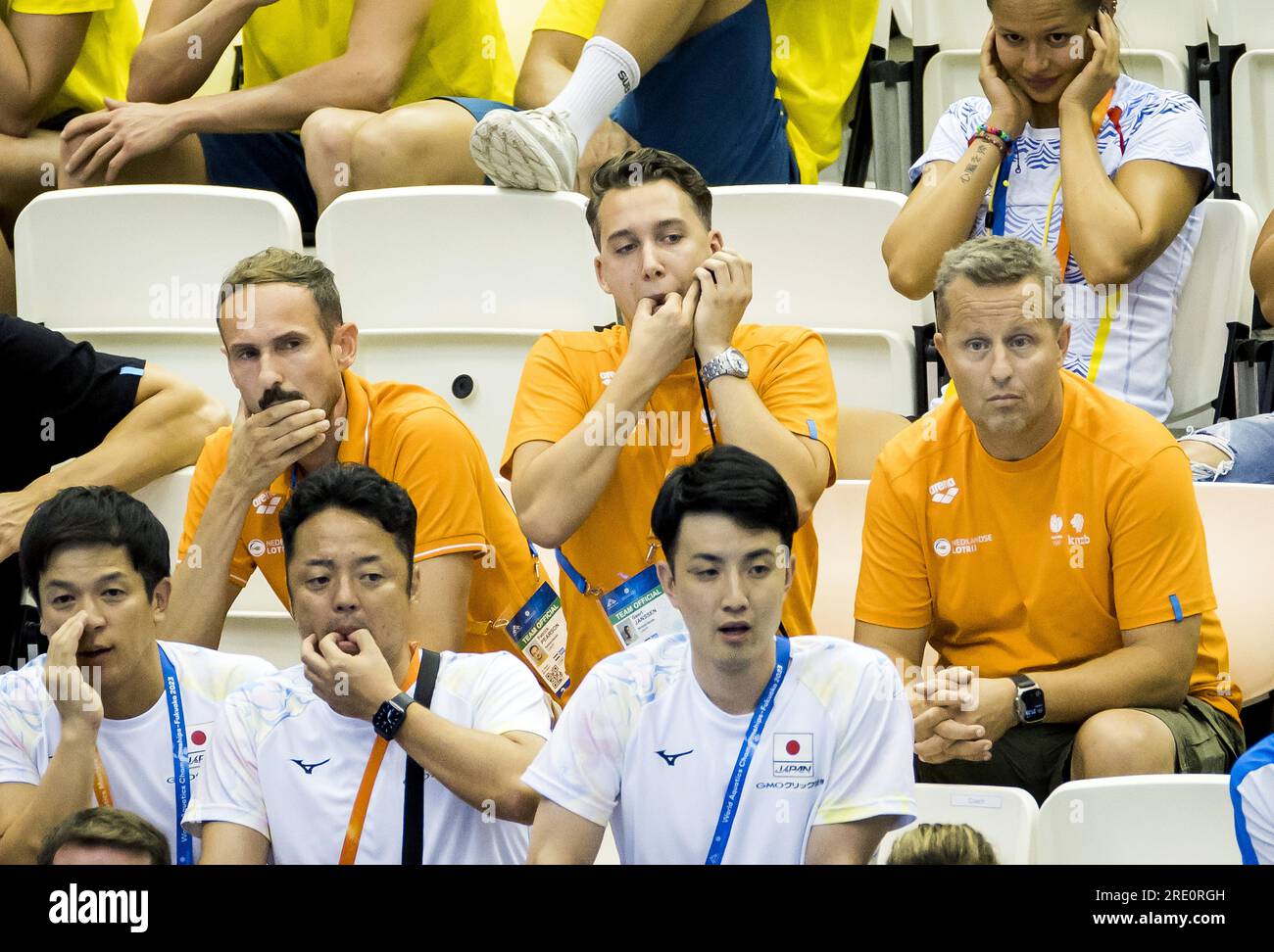 FUKUOKA - Coach Patrick Pearson, coach Geert Janssen and national coach Mark Faber during the final 200 substitution women during the World Swimming Championships in Japan. ANP KOEN VAN WEEL Stock Photo