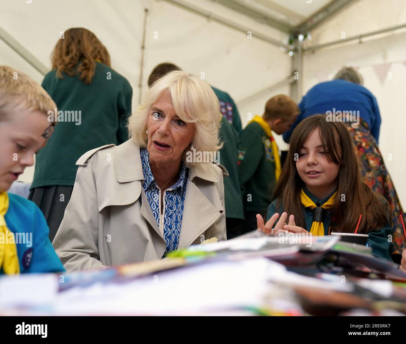 Queen Camilla meets Scouts during a visit to Redwings Horse Sanctuary at Anna Sewell House in Great Yarmouth, while on a visit to Norfolk. Redwings Horse Sanctuary have been the custodians of Anna Sewell House since 2022. The House is the verified birthplace of Anna Sewell, author of Black Beauty. Picture date: Monday July 24, 2023. Stock Photo