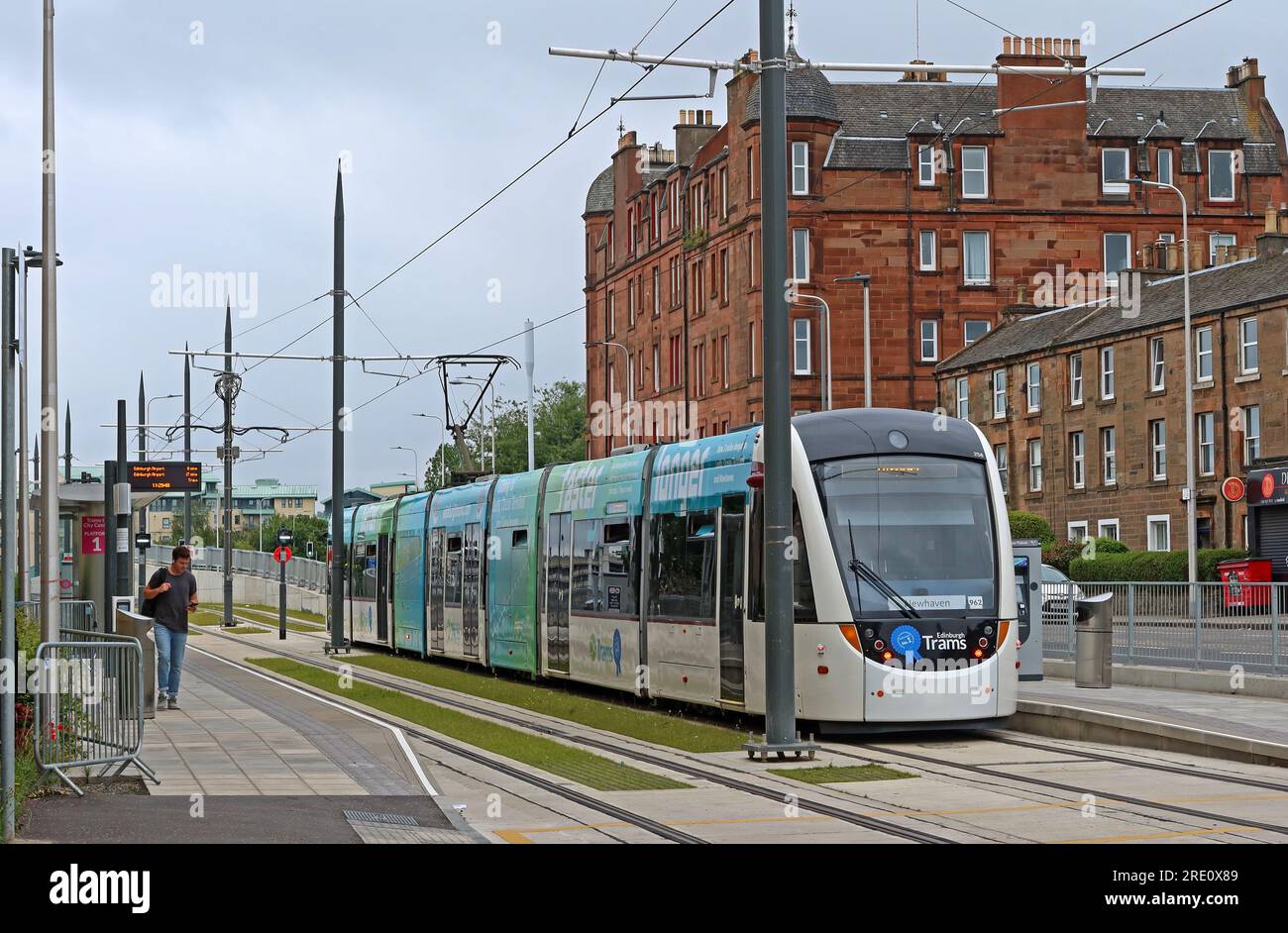 CAF Urbos 3 tram at the Edinburgh trams extension to Annfield, Newhaven, west of Leith, Edinburgh city centre, Lothians , Scotland, UK, EH6 4UD Stock Photo