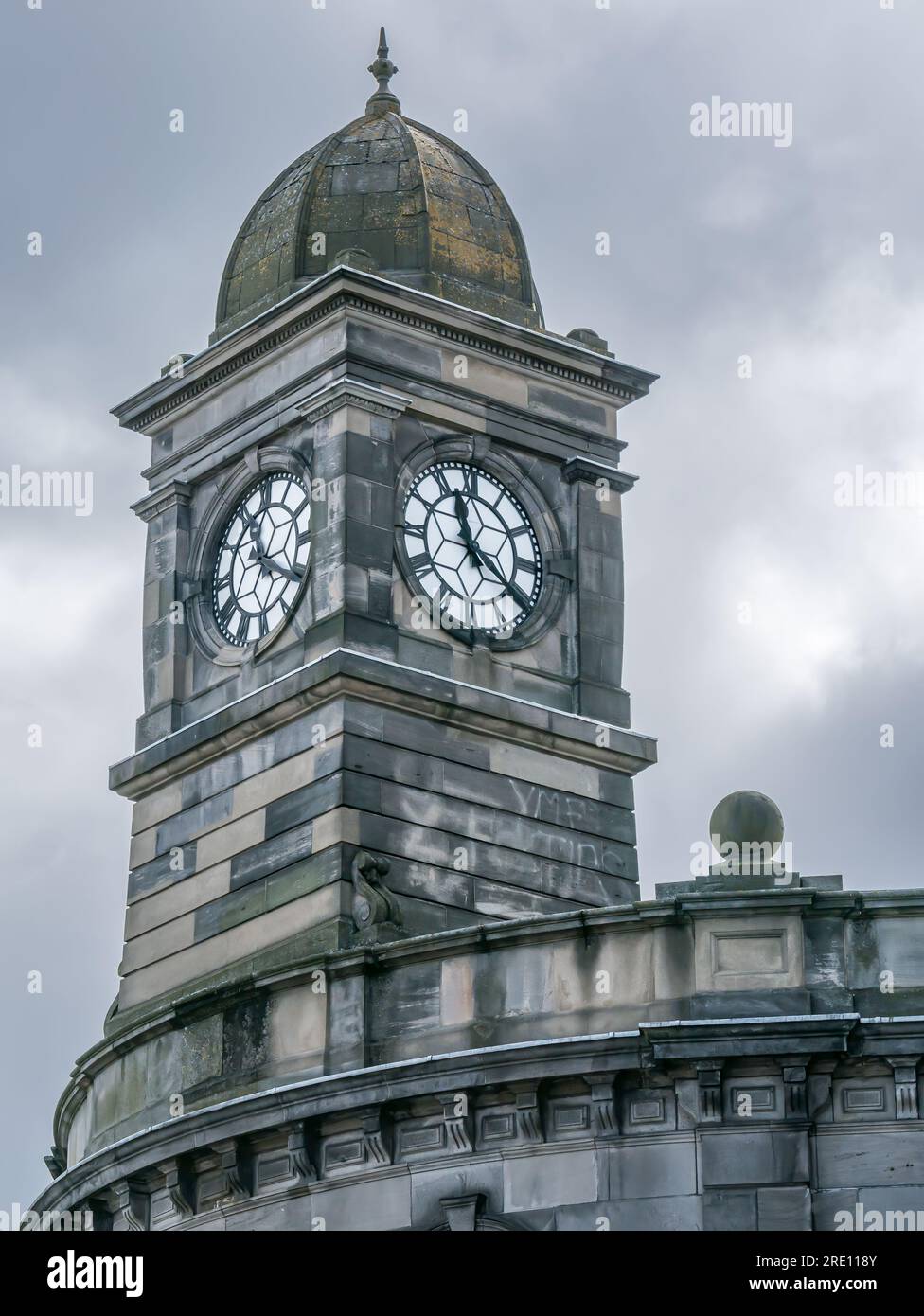 View of Old Leith Central Station clock tower with 11.20 am time against a stormy sky, Edinburgh, Scotland, UK Stock Photo