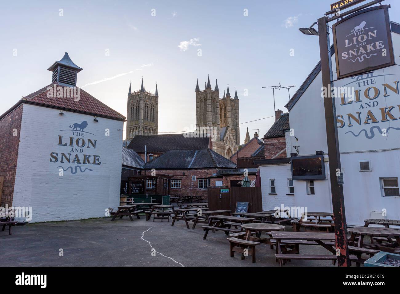 The Lion and Snake pub in Lincoln, UK ,  Lincoln Cathedral behind, Lincoln pubs, bar, bars, pub, pubs, eateries, restaurants, eating out, Stock Photo