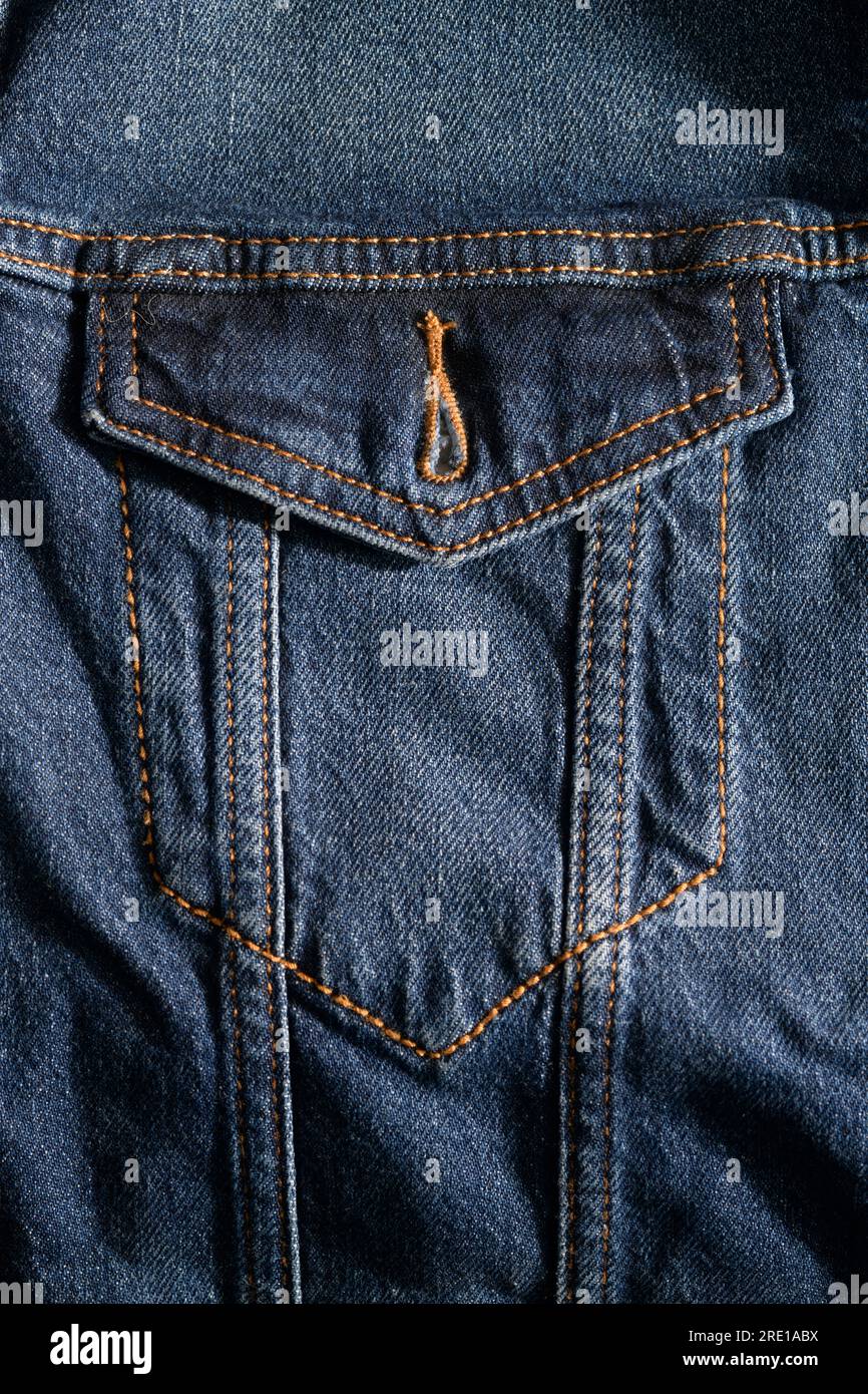 Close up of Denim Jacket Button Loop and Pocket Stock Photo
