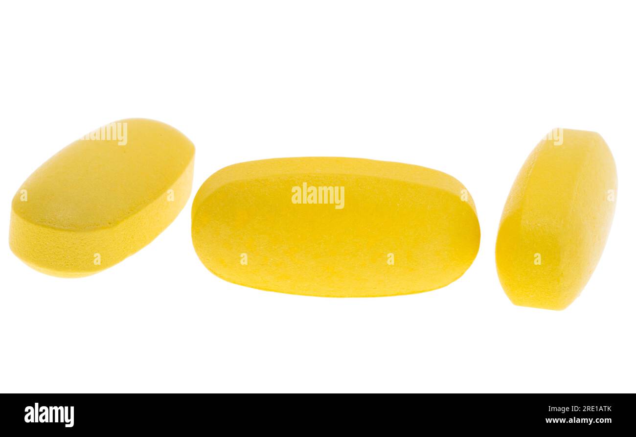 yellow pill isolated on white background Stock Photo Alamy