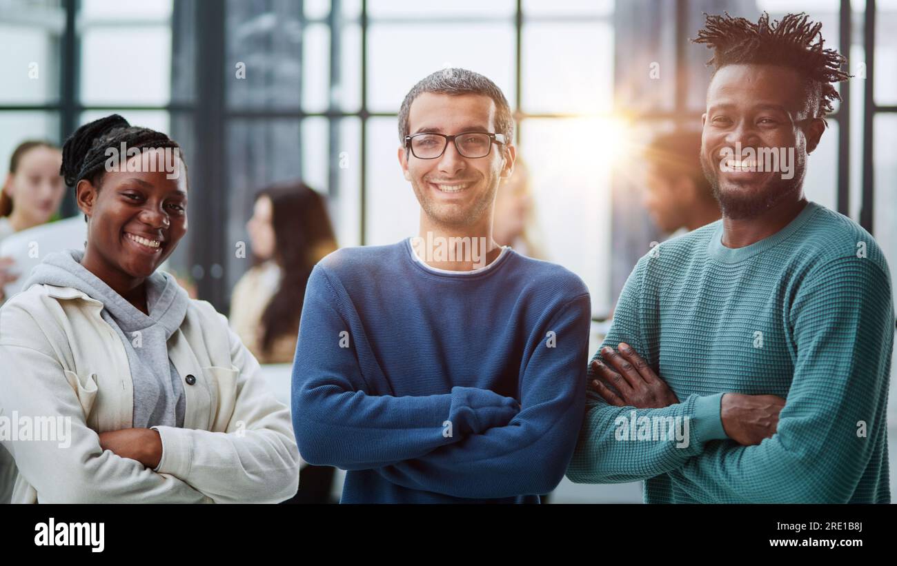 Multiethnic business team looking camera hi-res stock photography and ...