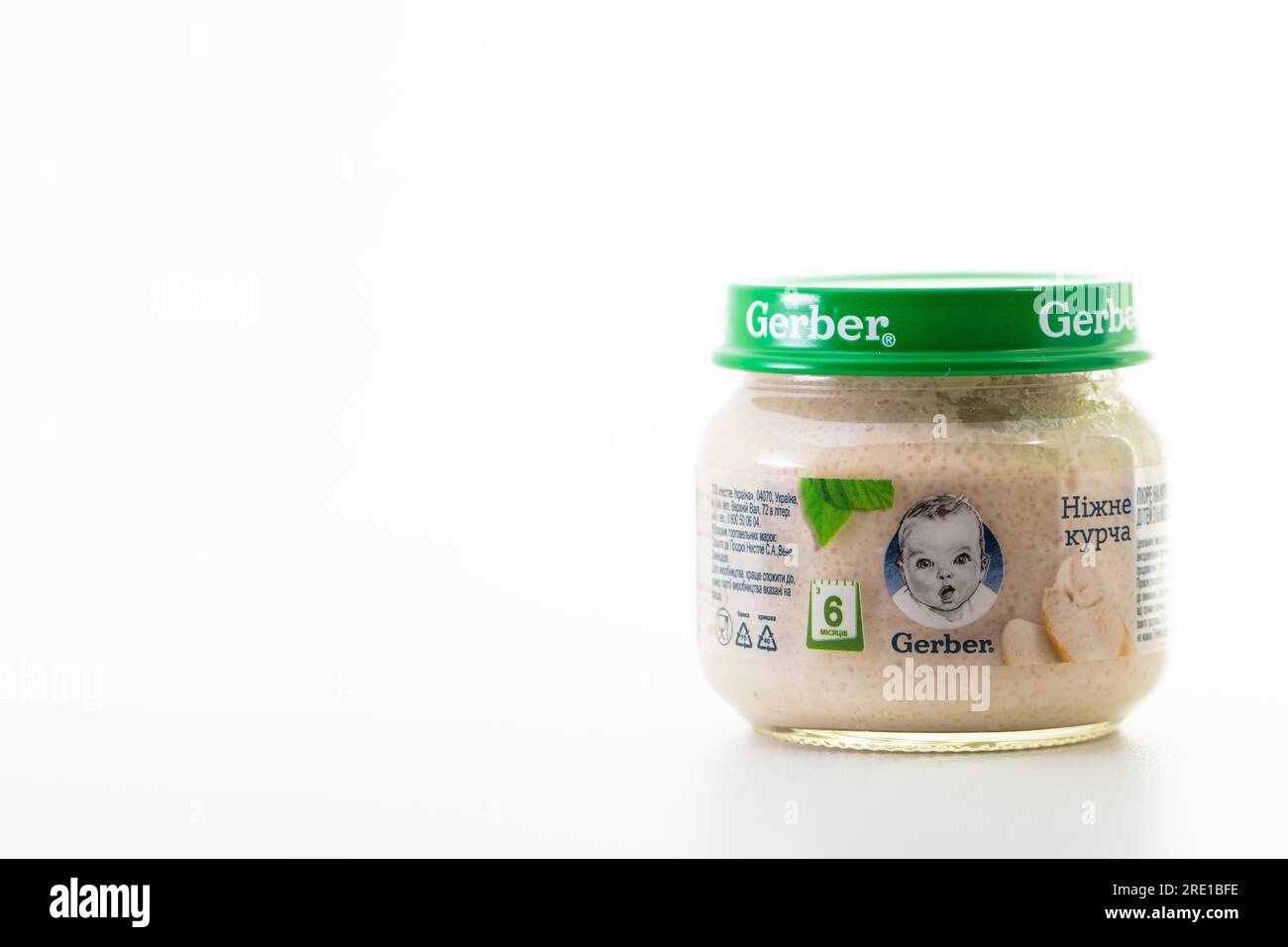 Lviv, Ukraine - March 22, 2020:  Gerber brand child nutrition chicken puree on white background Stock Photo