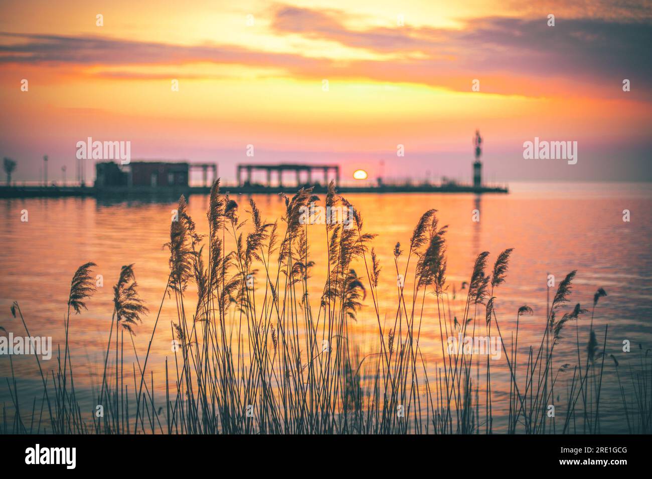 Balaton Siofok Hungary. Beautiful sunset at Lake Balaton, with reflection in the water Stock Photo