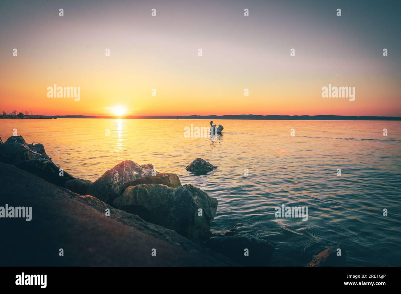 Balaton Siofok Hungary. Beautiful sunset at Lake Balaton, with reflection in the water Stock Photo