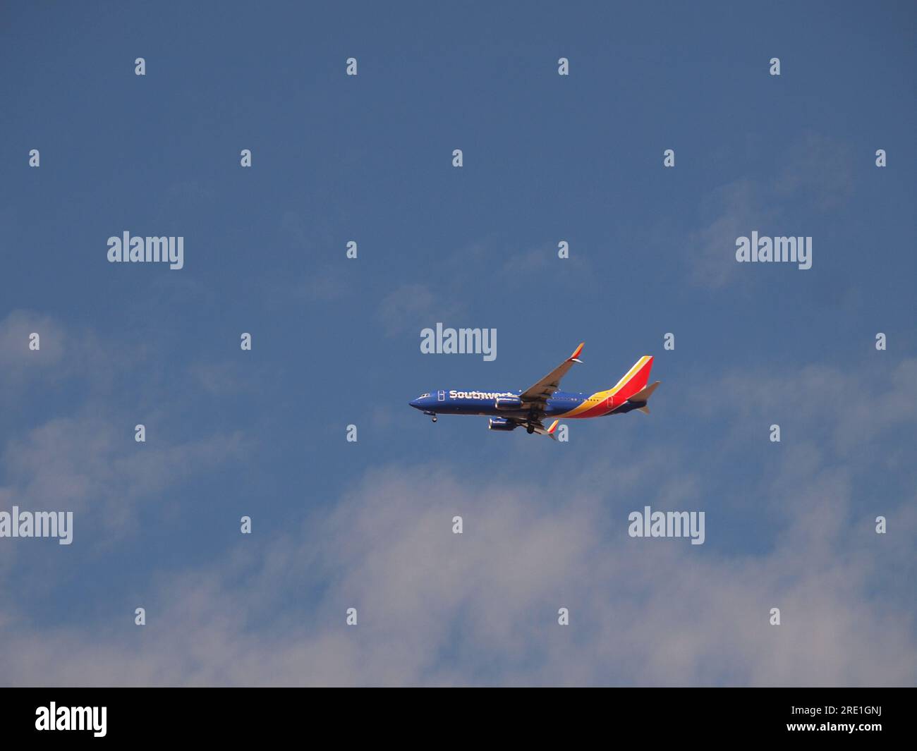 Modern jet airliners approaching an airport. in clear weather. Colorful airline livery makes the