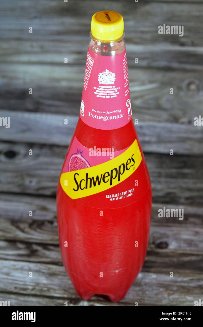 Giza, Egypt, July 21 2023:  Schweppes premium sparkling soft drink contains fruit pulp pomegranate flavor, Schweppes is a beverage brand that originat Stock Photo