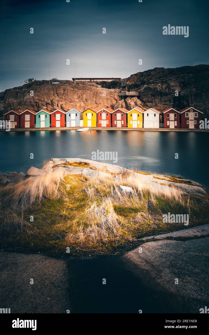 Sweden houses, small colorful fishermen's houses in Sweden smog. A ...