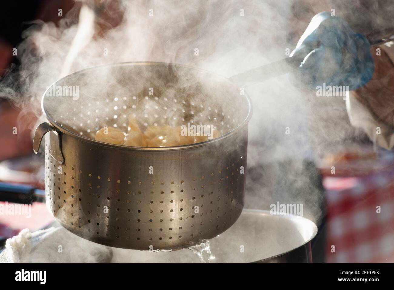 Pasta cooking hand pot water hi-res stock photography and images - Alamy