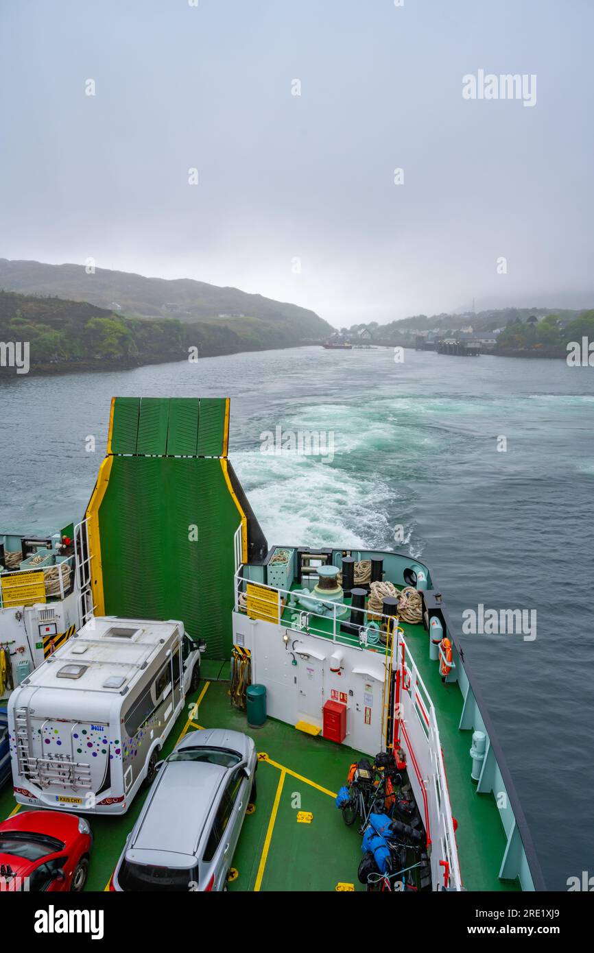 The CalMac ferry Clansman in the harbour at Target The Isle of Harris on a foggy morning Stock Photo