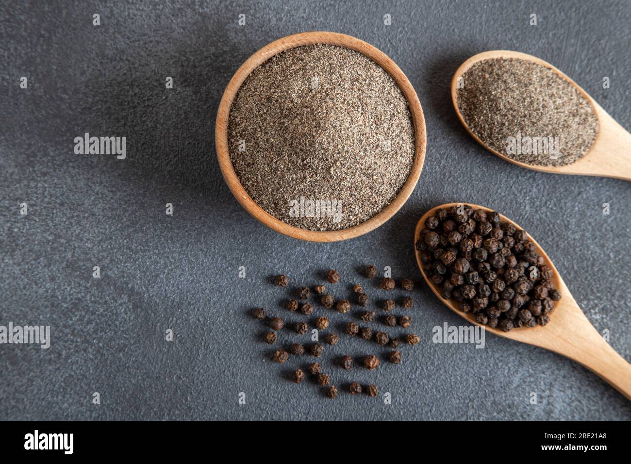Ground black pepper with grains of black pepper,closeup Stock Photo Alamy
