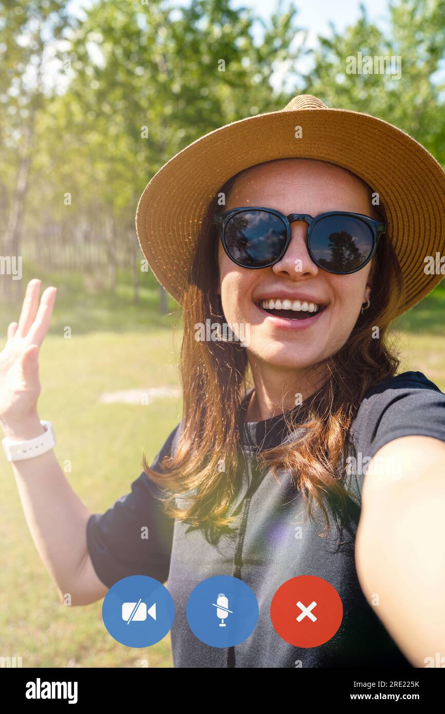 Vertical video woman in hat hi-res stock photography and images - Alamy